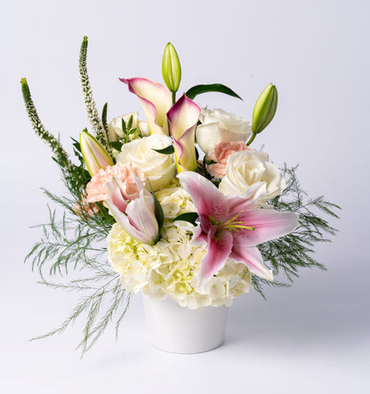 Elegant pastel vase with stargazer lilies, calla lilies, white roses, and hydrangea. A soft, romantic gift. Same-day Toronto flower delivery