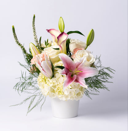 Elegant pastel vase with stargazer lilies, calla lilies, white roses, and hydrangea. A soft, romantic gift. Same-day Toronto flower delivery